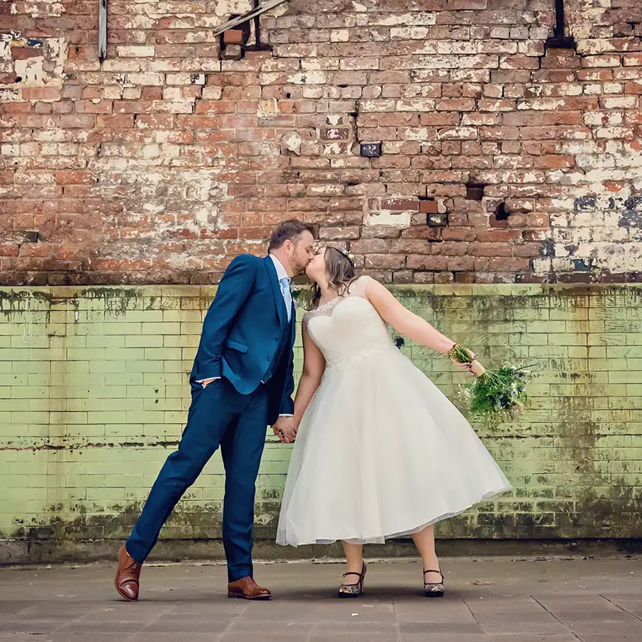 Newlyweds kissing after elopement in Worcester